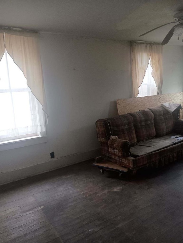 sitting room featuring ceiling fan and hardwood / wood-style floors