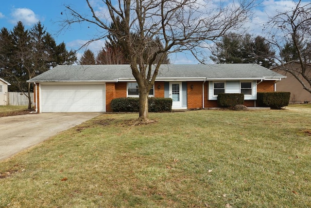 single story home featuring a garage and a front yard