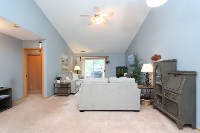 1690 Riva Ridge Dr, Mansfield, OH 44904 - living room with lofted ceiling, ceiling fan, light carpet, and baseboards