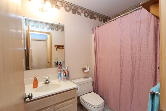 1690 Riva Ridge Dr, Mansfield, OH 44904 - full bathroom with vanity, toilet, and curtained shower