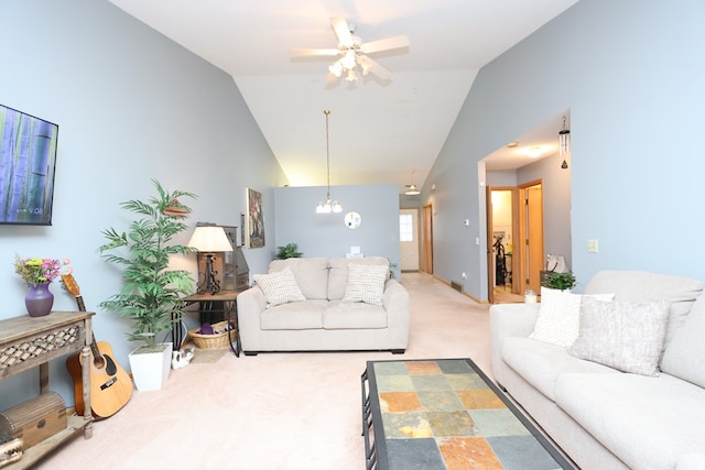 1690 Riva Ridge Dr, Mansfield, OH 44904 - carpeted living room with ceiling fan, high vaulted ceiling, and a chandelier