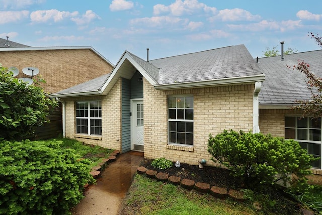 1690 Riva Ridge Dr, Mansfield, OH 44904 - view of front of house with brick siding and roof with shingles