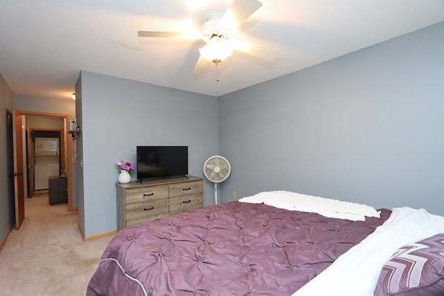 1690 Riva Ridge Dr, Mansfield, OH 44904 - bedroom with light carpet, a ceiling fan, and baseboards