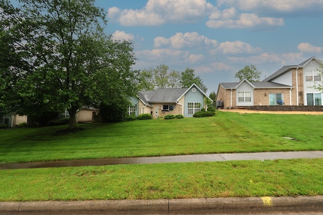 1690 Riva Ridge Dr, Mansfield, OH 44904 - view of front of house featuring brick siding and a front yard