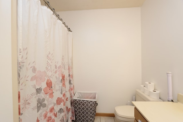 1690 Riva Ridge Dr, Mansfield, OH 44904 - full bathroom featuring toilet, vanity, tile patterned flooring, and a shower with curtain