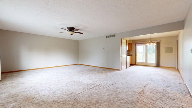 62 Elmridge Rd, Mansfield, OH 44907 - empty room featuring carpet, baseboards, ceiling fan, a textured ceiling, and a chandelier