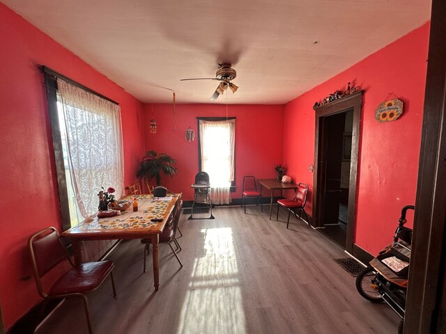 514 Clark St, Willard, OH 44890 - dining area featuring wood finished floors and a ceiling fan