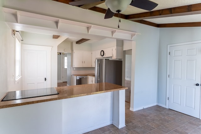 kitchen with white cabinets, ceiling fan, kitchen peninsula, and appliances with stainless steel finishes