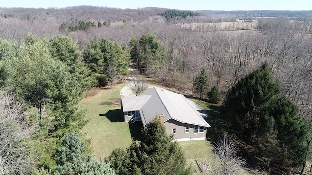 aerial view featuring a view of trees
