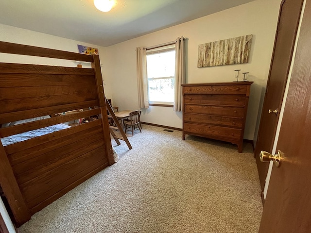 bedroom with light carpet, baseboards, and visible vents