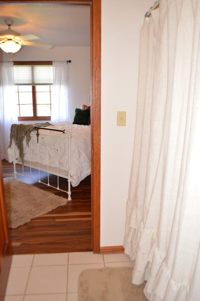 interior space featuring ceiling fan