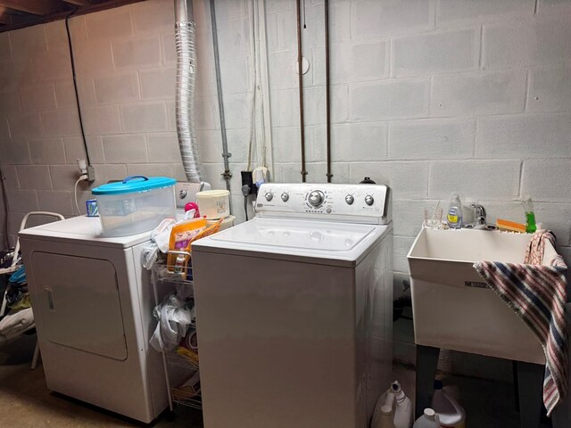 763 Sunnyside Dr, Galion, OH 44833 - laundry room with washer and dryer and concrete block wall