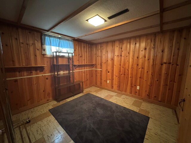 763 Sunnyside Dr, Galion, OH 44833 - finished below grade area featuring tile patterned floors and wooden walls