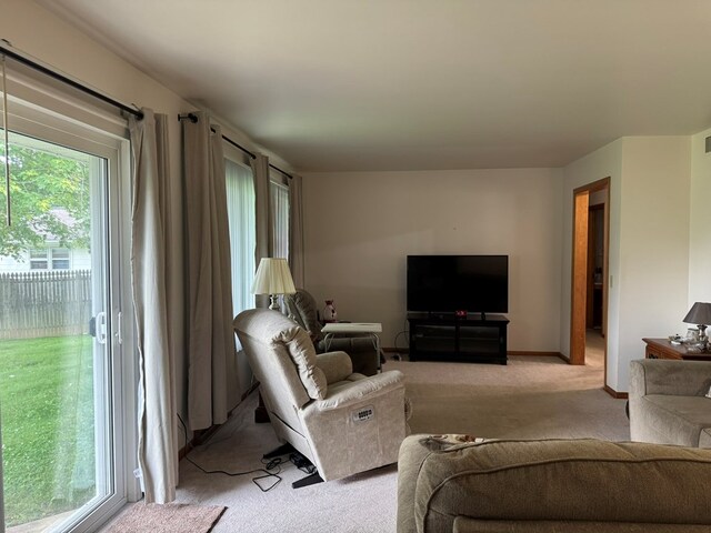 763 Sunnyside Dr, Galion, OH 44833 - living room with light carpet and baseboards