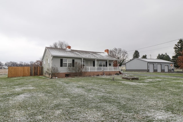 ranch-style house with a porch and a front yard