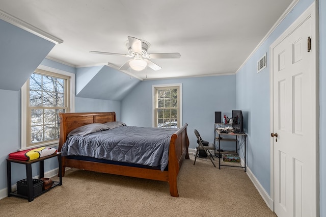 bedroom featuring crown molding, ceiling fan, vaulted ceiling, and light carpet