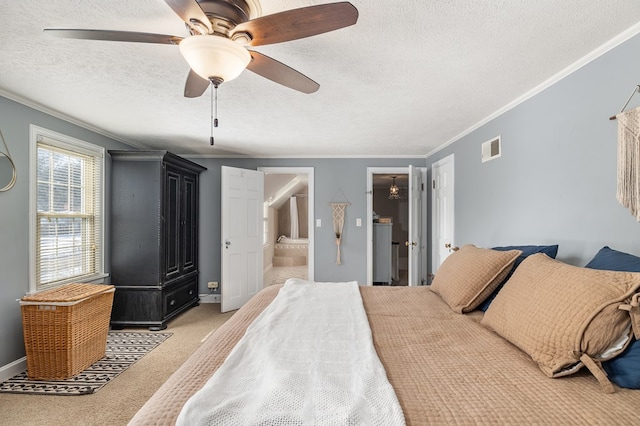 bedroom featuring crown molding, light carpet, and a textured ceiling