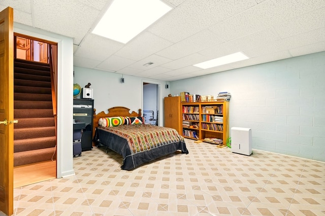 1515 Oak Run Ct, Mansfield, OH 44906 - bedroom featuring a drop ceiling and concrete block wall