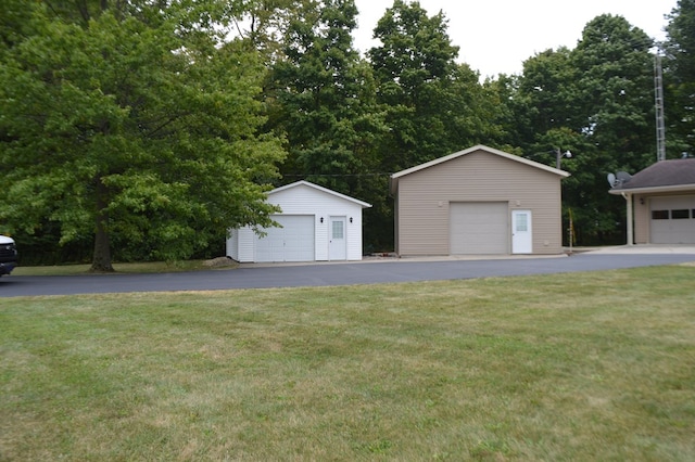 garage with a yard