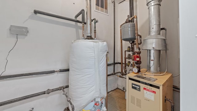 utility room with water heater