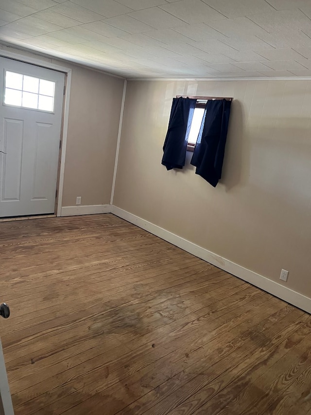 spare room featuring hardwood / wood-style floors