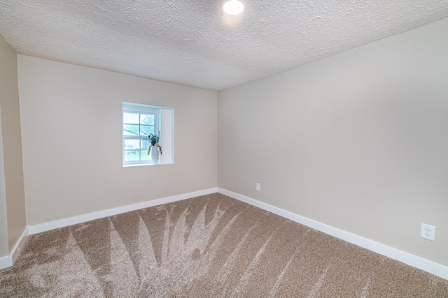 7331 State Route 314, Bellville, OH 44813 - spare room featuring carpet flooring and a textured ceiling