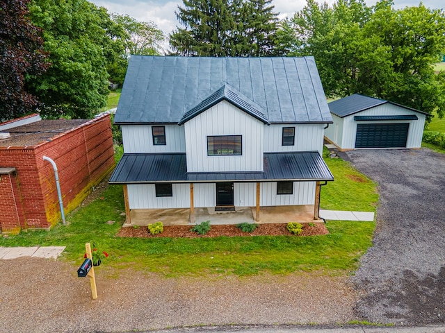 7331 State Route 314, Bellville, OH 44813 - modern inspired farmhouse with a metal roof, an outdoor structure, a garage, and a standing seam roof