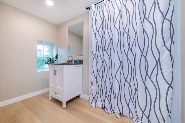 7331 State Route 314, Bellville, OH 44813 - bathroom featuring wood finished floors, vanity, curtained shower, and recessed lighting