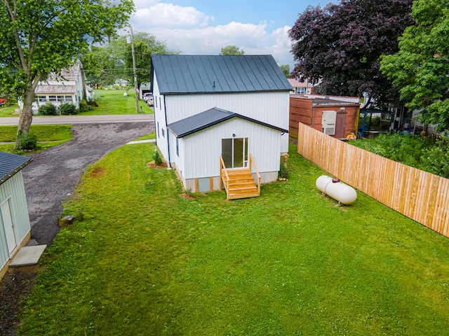 7331 State Route 314, Bellville, OH 44813 - back of property featuring entry steps and a metal roof