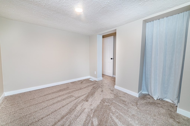 7331 State Route 314, Bellville, OH 44813 - carpeted spare room featuring baseboards and a textured ceiling