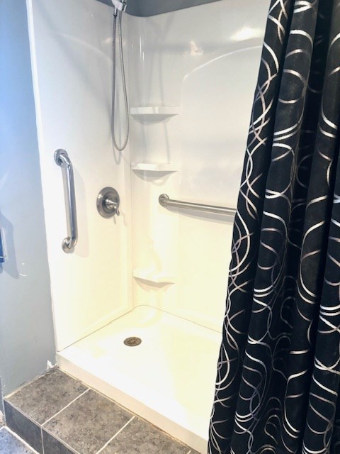 bathroom featuring walk in shower