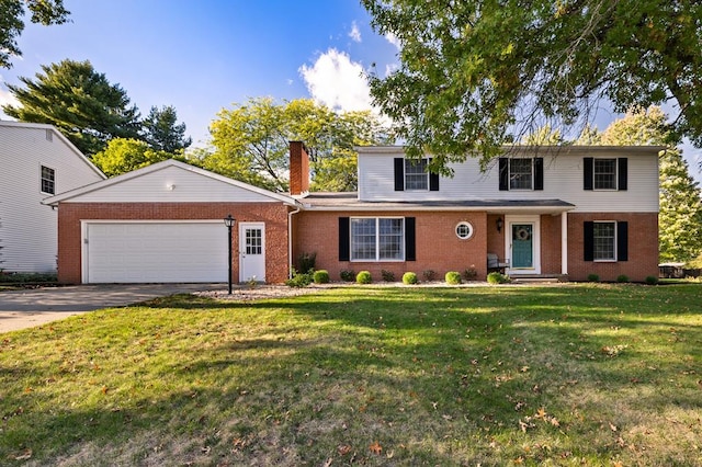 view of front facade with a front yard and a garage