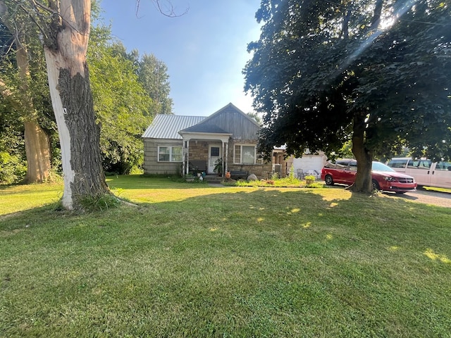 3763 State Route 39, Shelby, OH 44875 - view of front of house with a front yard and a metal roof