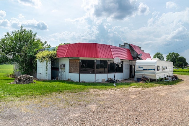 3763 State Route 39, Shelby, OH 44875 - view of front of property featuring a metal roof, concrete block siding, and driveway
