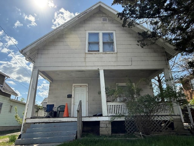 bungalow-style home with a porch