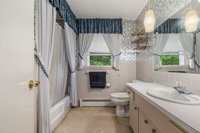 2055 Random Dr, Mansfield, OH 44904 - full bath featuring baseboard heating, vanity, plenty of natural light, tile walls, and wallpapered walls
