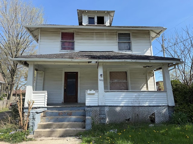 traditional style home with covered porch