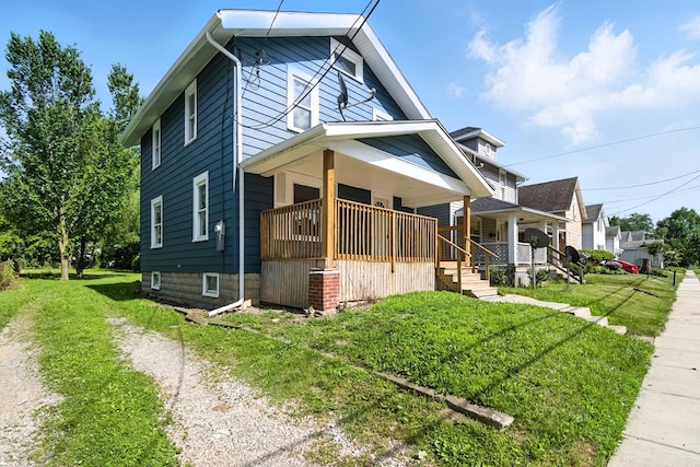 456 Park St, Marion, OH 43302 - view of property exterior with a porch and a yard