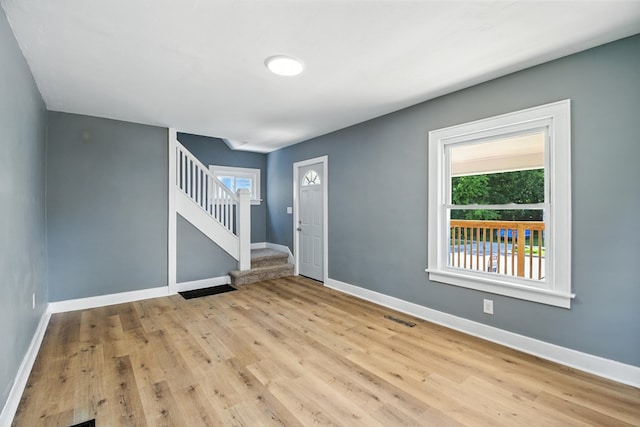 456 Park St, Marion, OH 43302 - foyer with stairs and wood finished floors