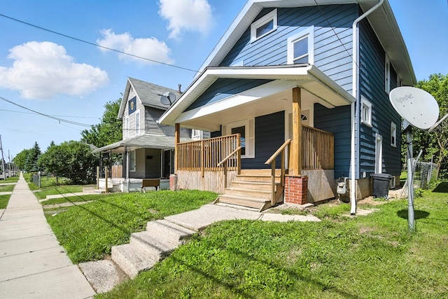 456 Park St, Marion, OH 43302 - view of front of house with covered porch and a front lawn