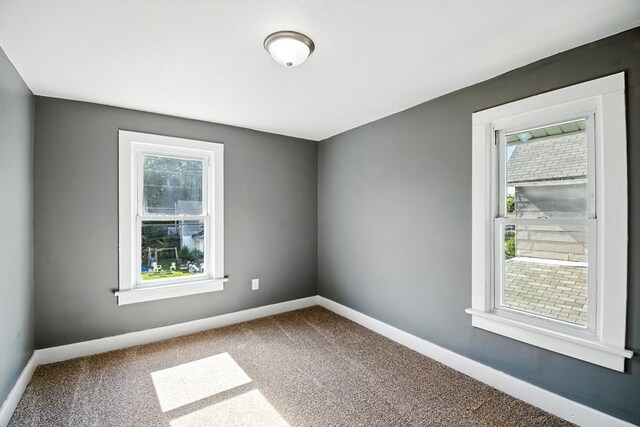 456 Park St, Marion, OH 43302 - carpeted spare room featuring baseboards