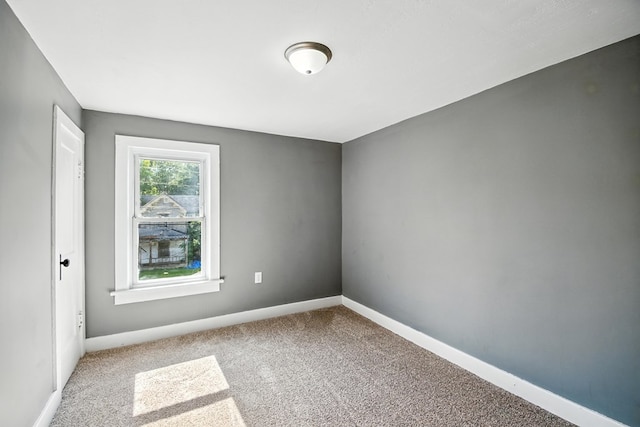 456 Park St, Marion, OH 43302 - carpeted empty room with baseboards
