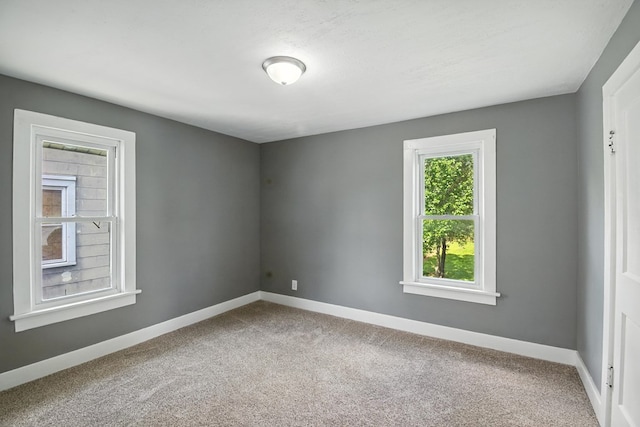 456 Park St, Marion, OH 43302 - carpeted empty room featuring baseboards