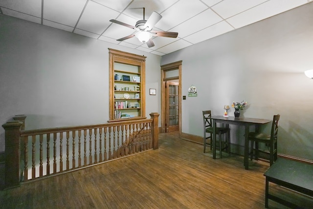 38 E Main St, Shelby, OH 44875 - corridor featuring wood finished floors, an upstairs landing, and a drop ceiling