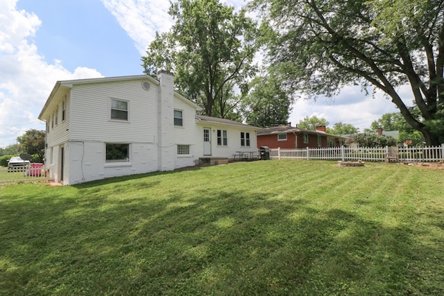 468 Clearview Rd, Mansfield, OH 44907 - back of house featuring a chimney and brick siding