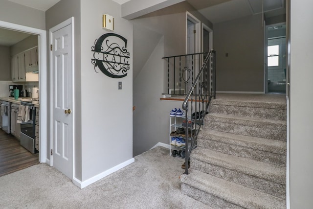 468 Clearview Rd, Mansfield, OH 44907 - stairway with baseboards and carpet floors