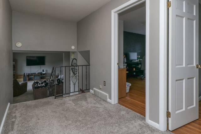 468 Clearview Rd, Mansfield, OH 44907 - corridor with carpet floors, a desk, and an upstairs landing