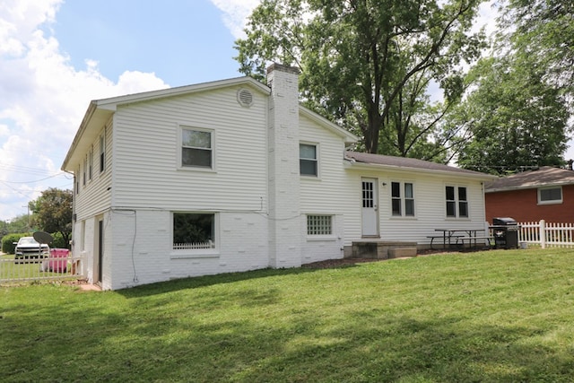 468 Clearview Rd, Mansfield, OH 44907 - back of house featuring a chimney and brick siding