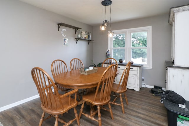 468 Clearview Rd, Mansfield, OH 44907 - dining room featuring dark wood-style flooring and baseboards