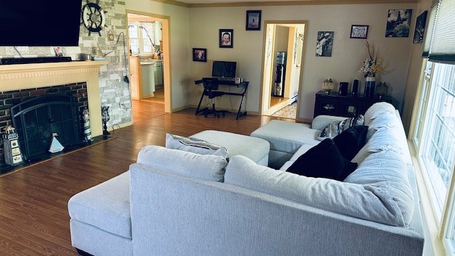 920 Woodbine St, Willard, OH 44890 - living room with wood finished floors and a fireplace